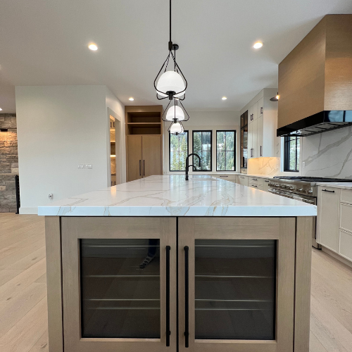 showroom tile kitchen countertops, cabinets, overhead lighting